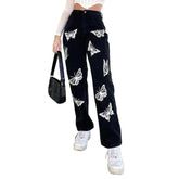 Schwarze Damenjeans mit Schmetterlingen